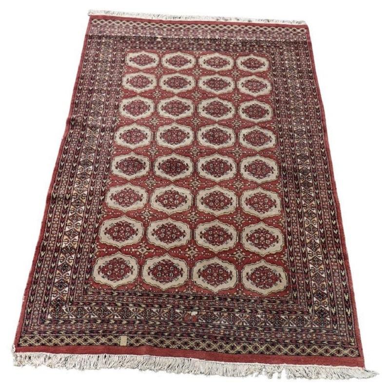Tappeto Bukhara annodato a mano prima metà sec XX misure 156 x 247